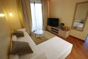 23-inch flat-screen TV with cable channels, TV, pay films