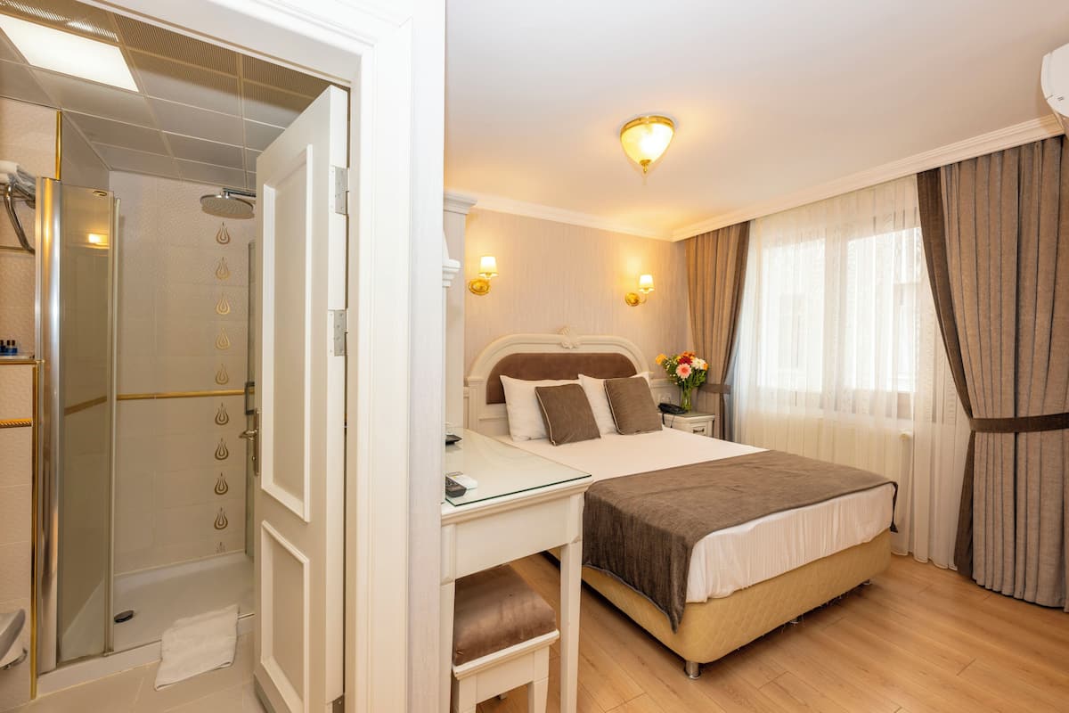 Chambre Simple Standard | 1 chambre, minibar, coffres-forts dans les chambres, rideaux occultants