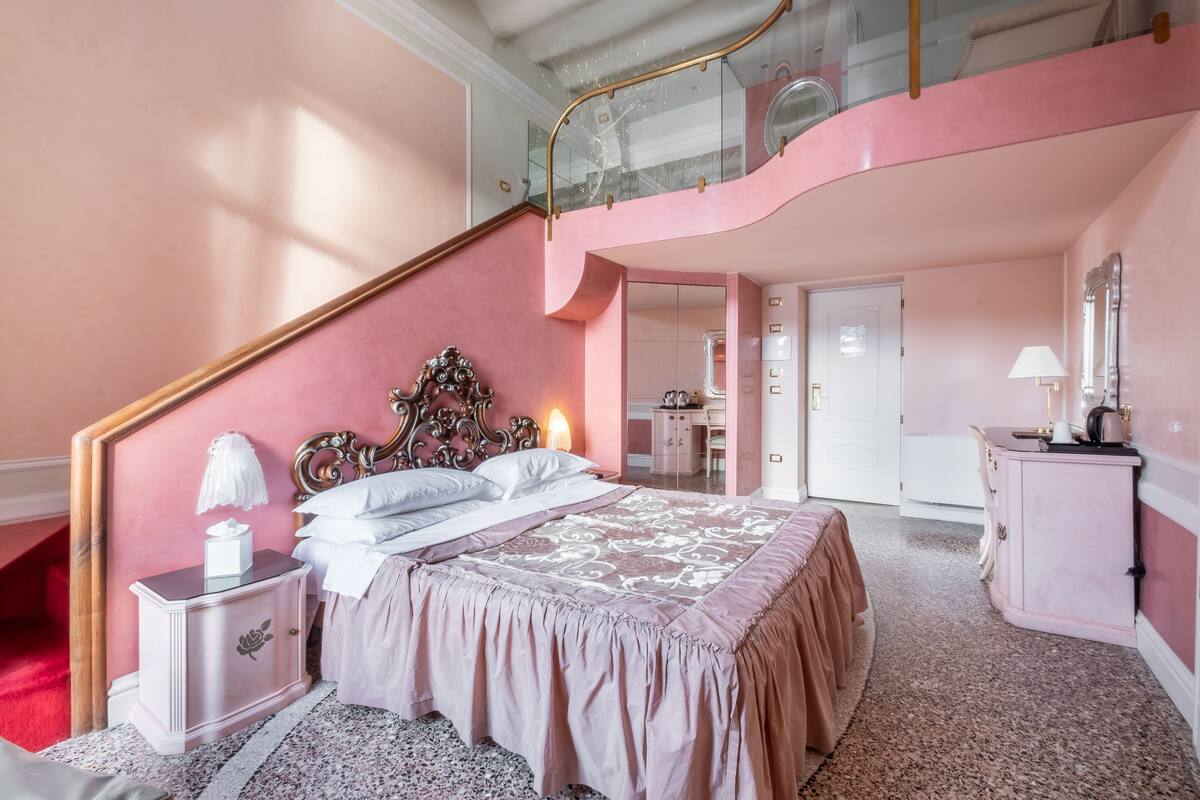 Junior Suite, Balcony, Lake View | Minibar, desk, laptop workspace, soundproofing
