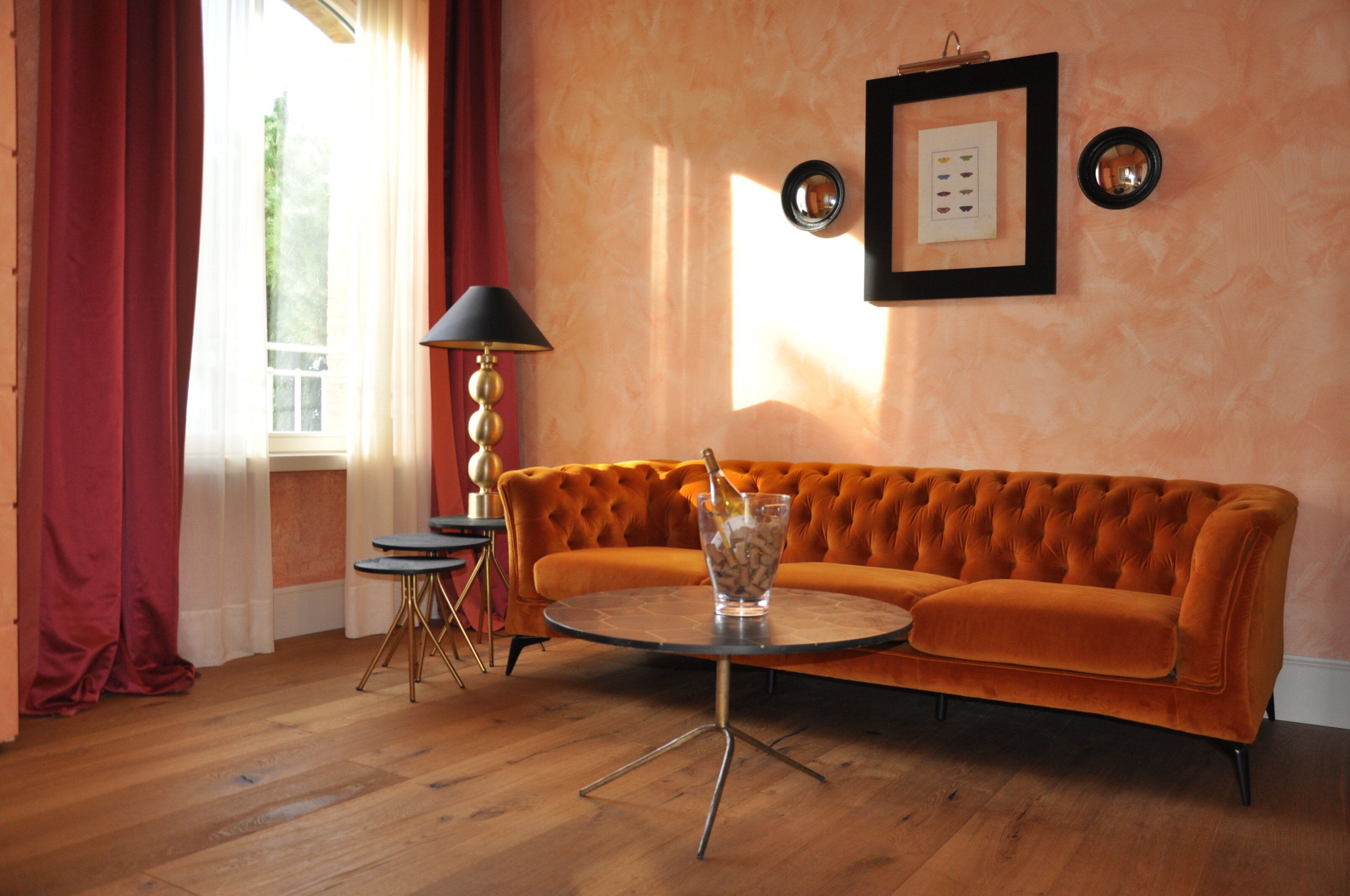 junior suite, garden view (granaio) | living room | lcd tv, dvd player