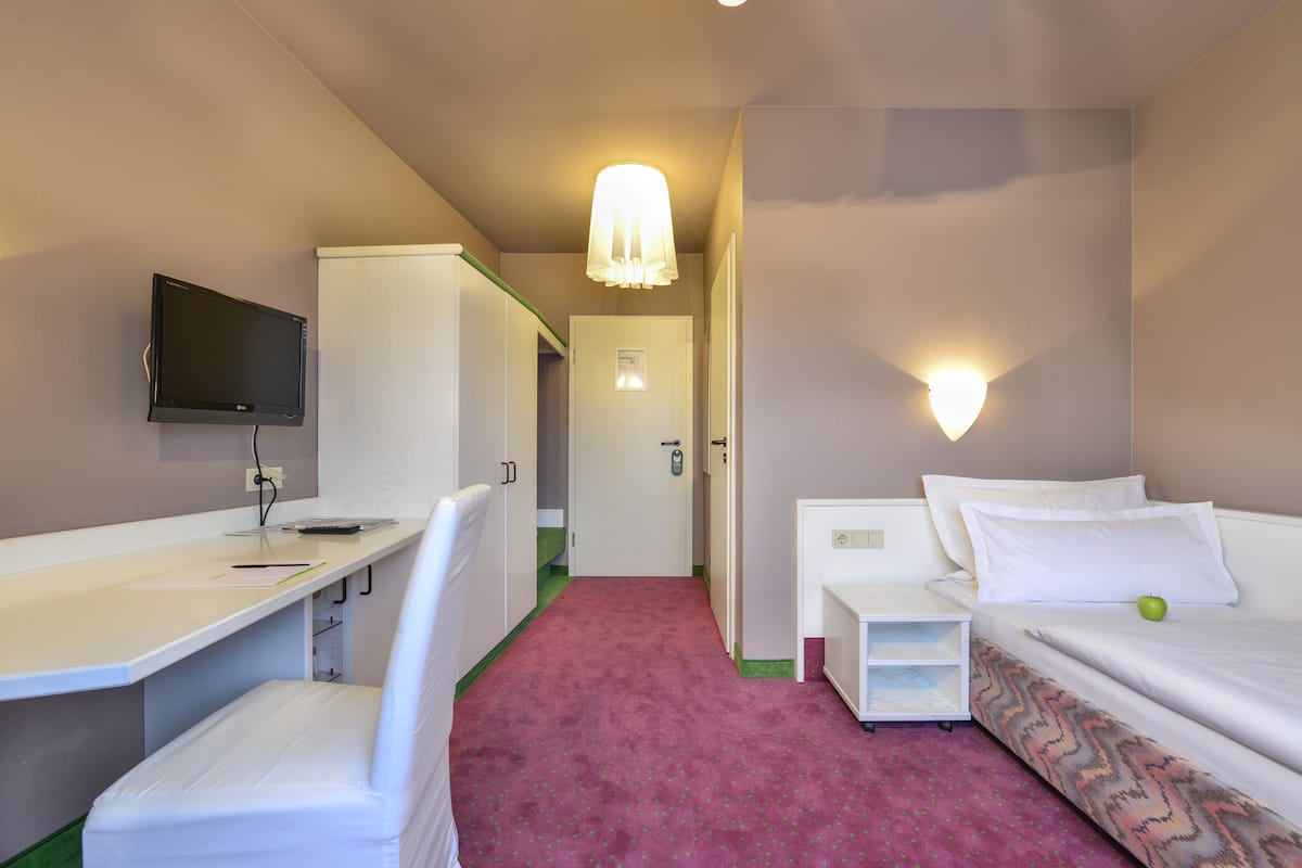 standard single room | desk, blackout curtains, iron/ironing board, rollaway beds