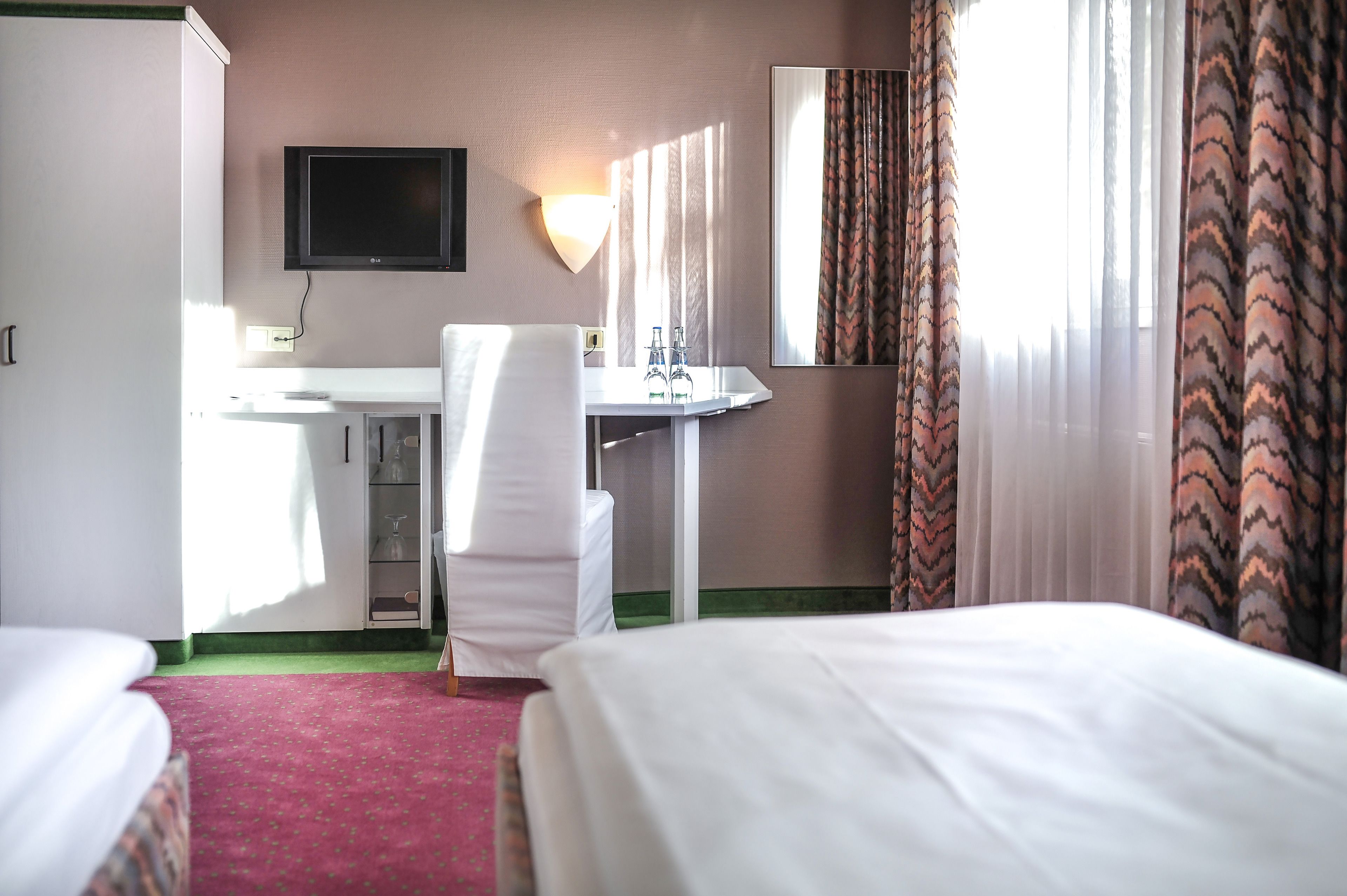 standard double room | desk, blackout curtains, iron/ironing board, rollaway beds