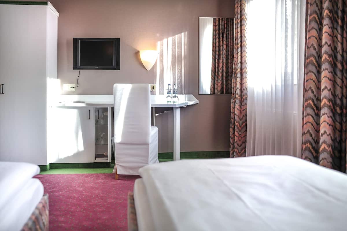 standard double room | desk, blackout curtains, iron/ironing board, rollaway beds