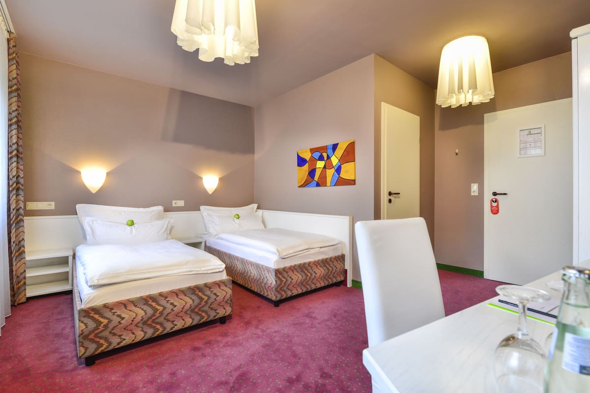 standard double room | desk, blackout curtains, iron/ironing board, rollaway beds