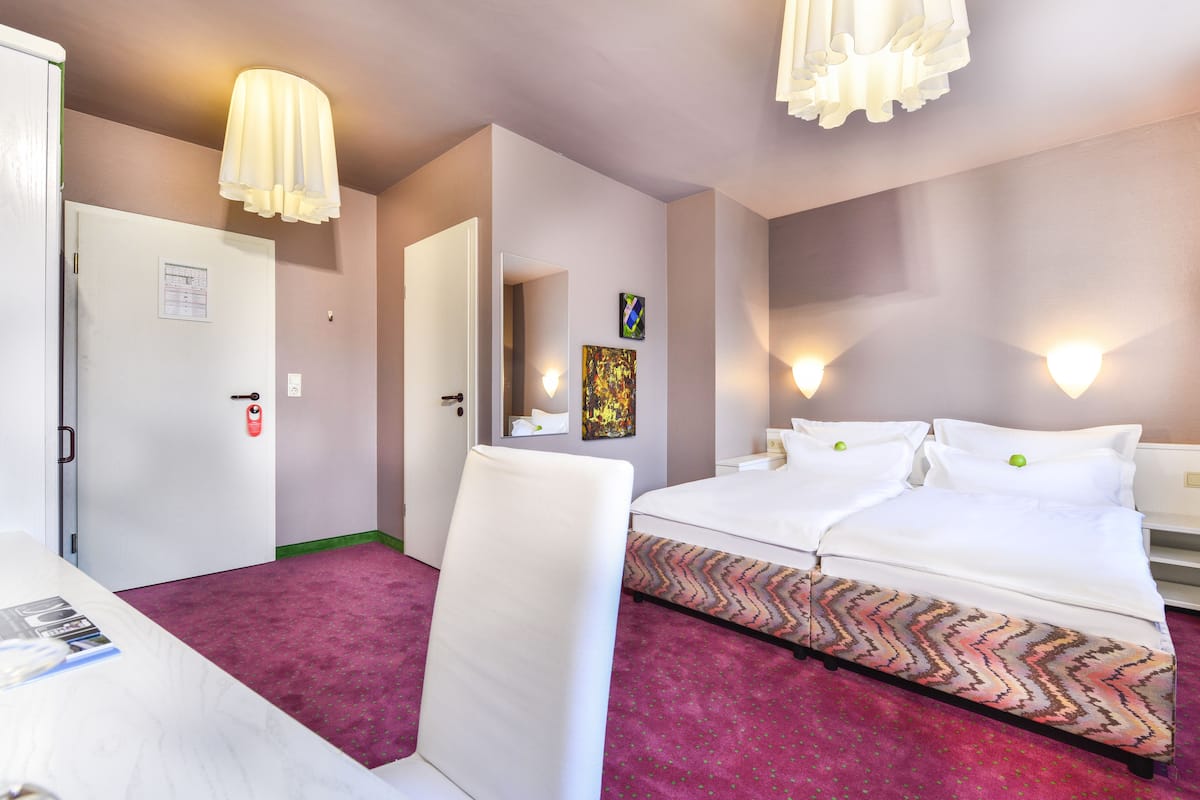 standard double room | desk, blackout curtains, iron/ironing board, rollaway beds