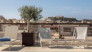 Seasonal outdoor pool, open 10 AM to 6 PM, pool umbrellas, sun loungers