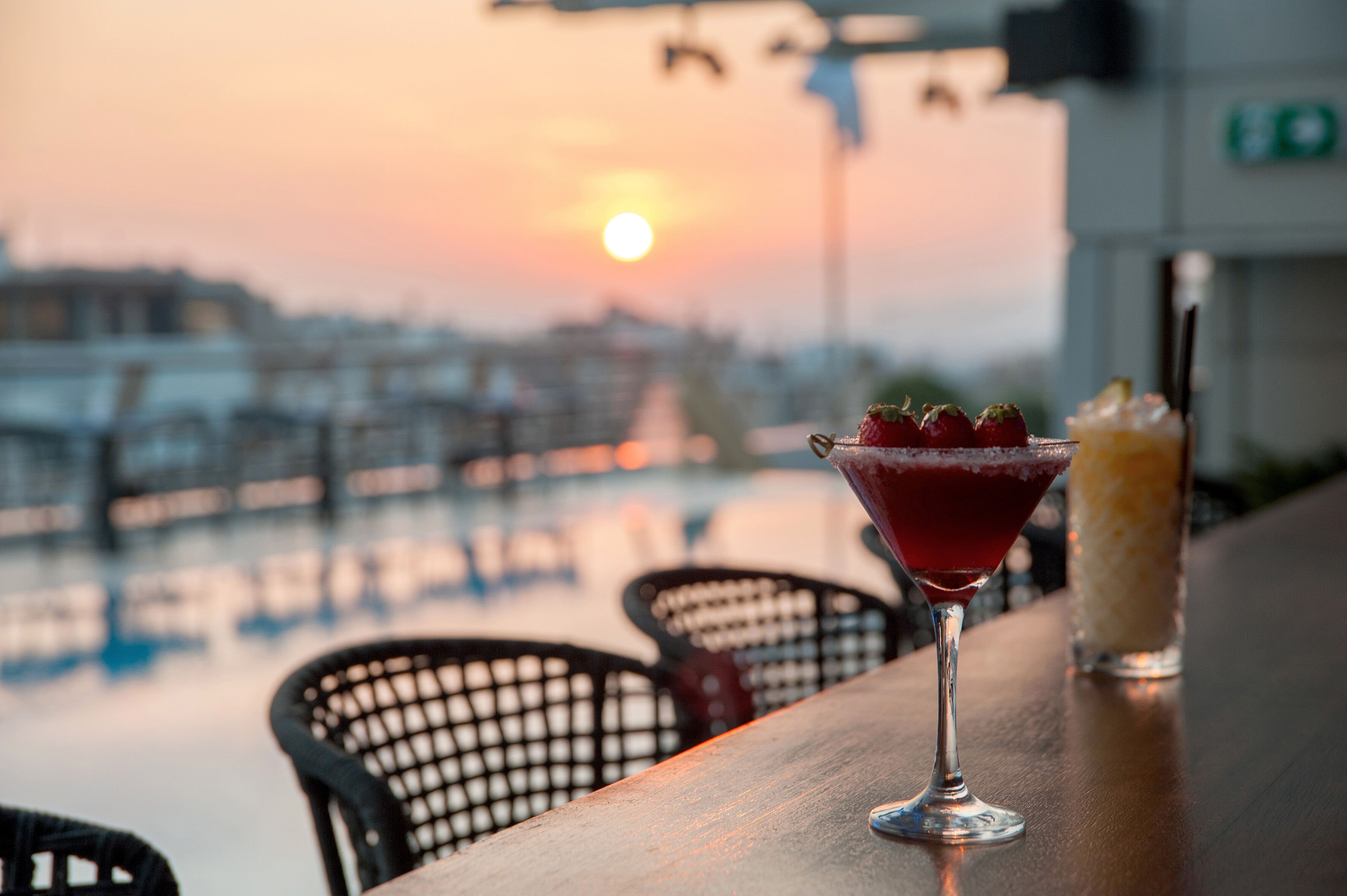 seasonal outdoor pool, open 10 am to 6 pm, pool umbrellas, pool loungers