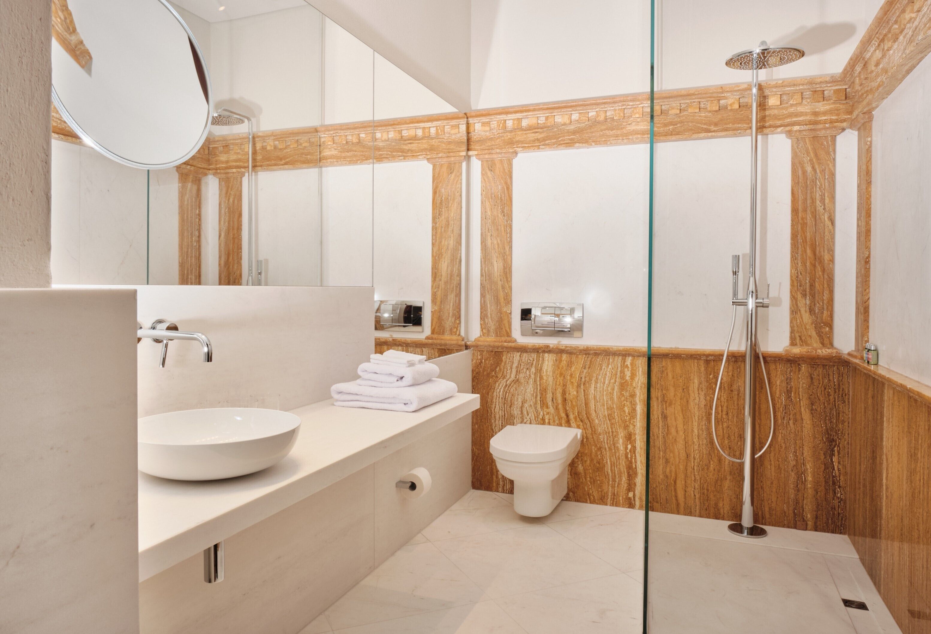 junior suite | bathroom | designer toiletries, hair dryer, bathrobes, slippers