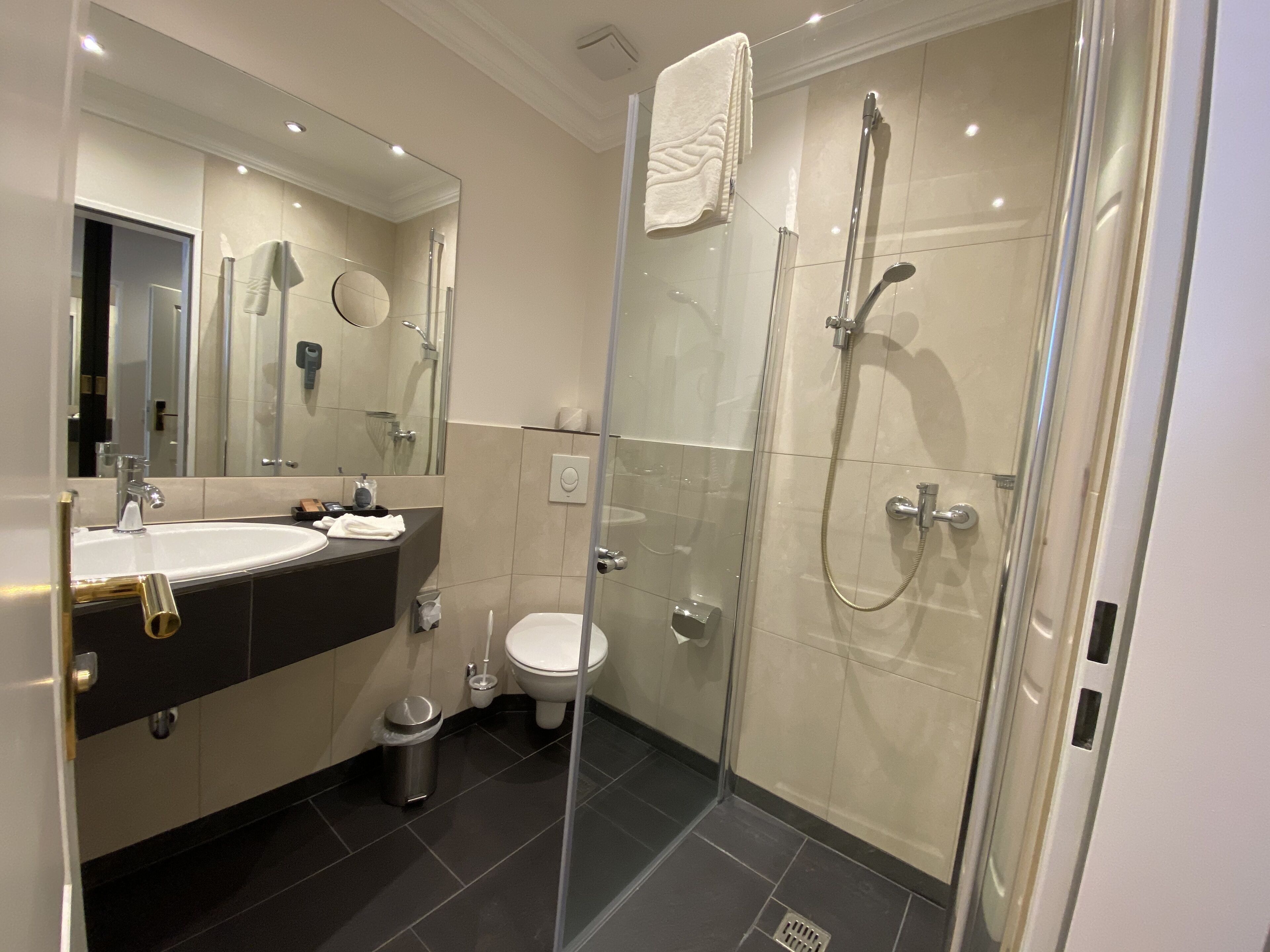 shower, hair dryer, bathrobes, towels