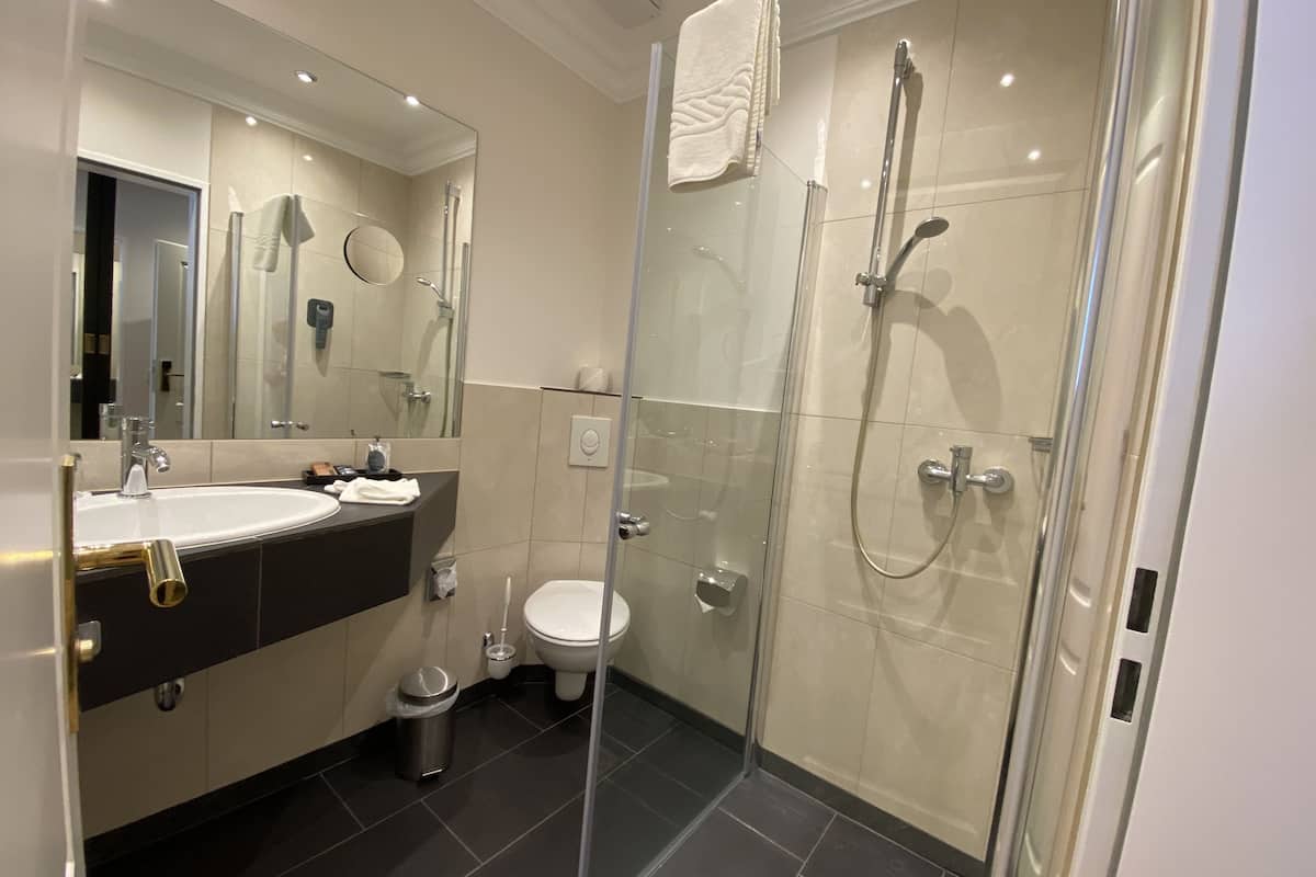 shower, hair dryer, bathrobes, towels