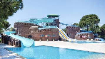 Enjoy a fun-filled day at this water park with a large pool area featuring multiple slides and water features.