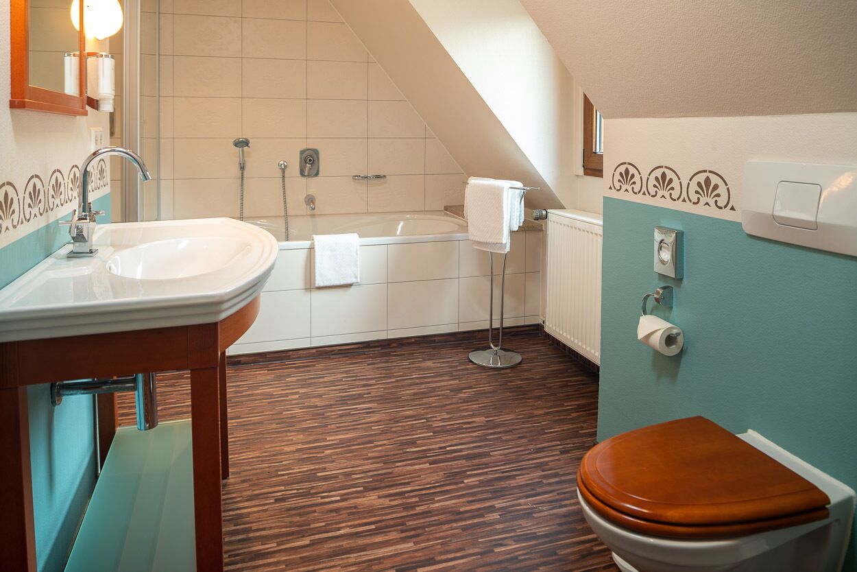 junior suite, river view | bathroom | free toiletries, hair dryer, bathrobes, towels