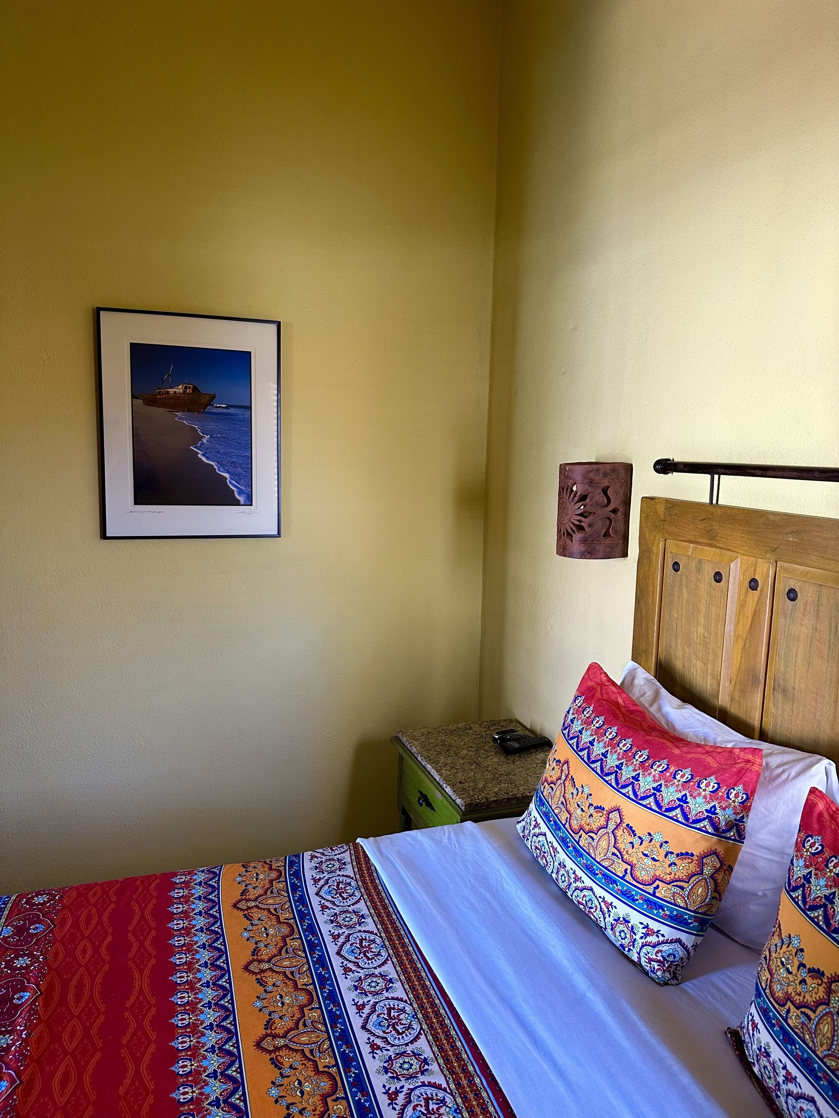 classic suite, 1 queen bed, kitchenette | premium bedding, in-room safe, blackout curtains, iron/ironing board