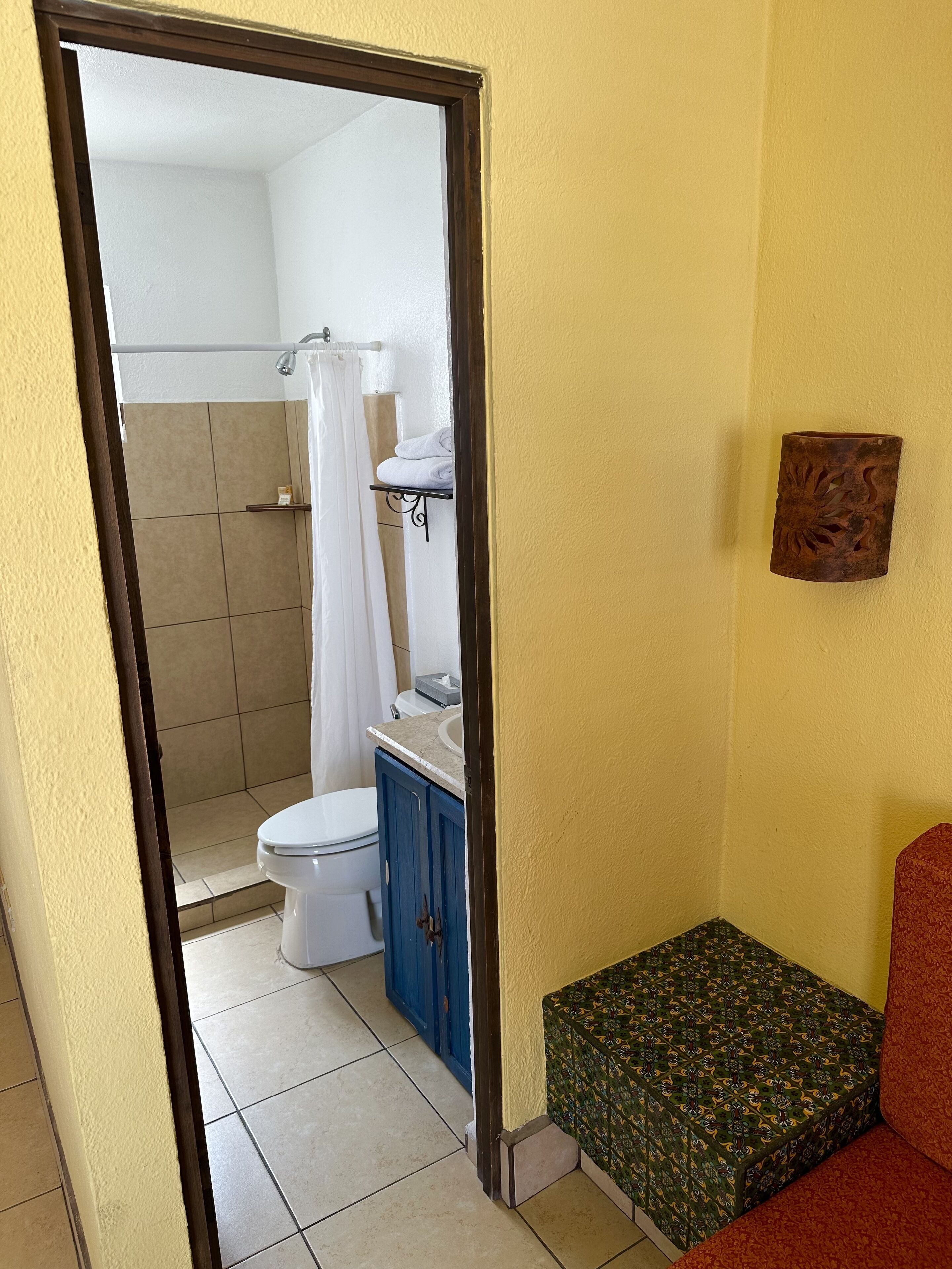 standard double room, 2 queen beds | bathroom | combined shower/bathtub, free toiletries, hair dryer, towels