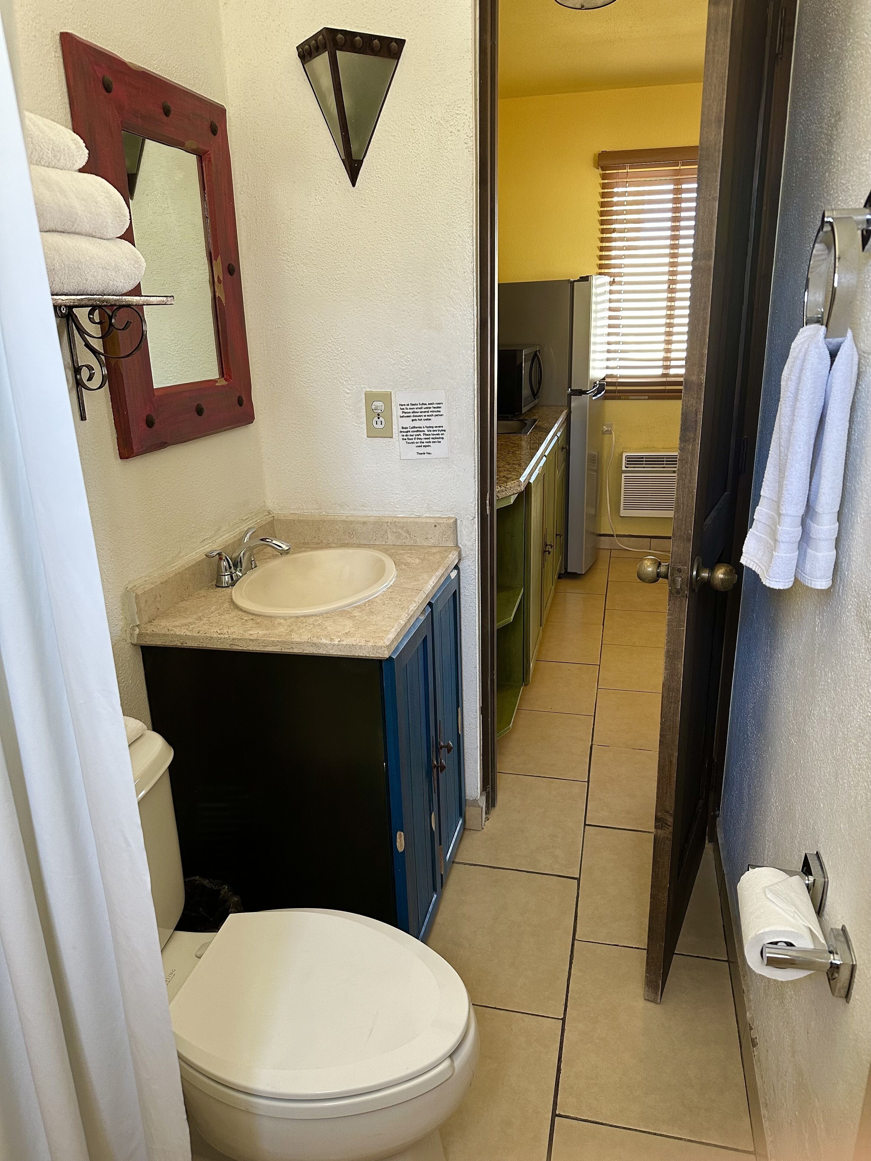 classic suite, 1 queen bed, kitchenette | bathroom | combined shower/bathtub, free toiletries, hair dryer, towels