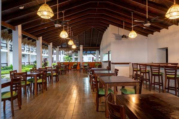 Breakfast, lunch, dinner served; international cuisine, pool views