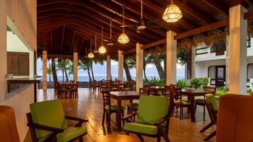 Breakfast, lunch, dinner served; international cuisine, pool views