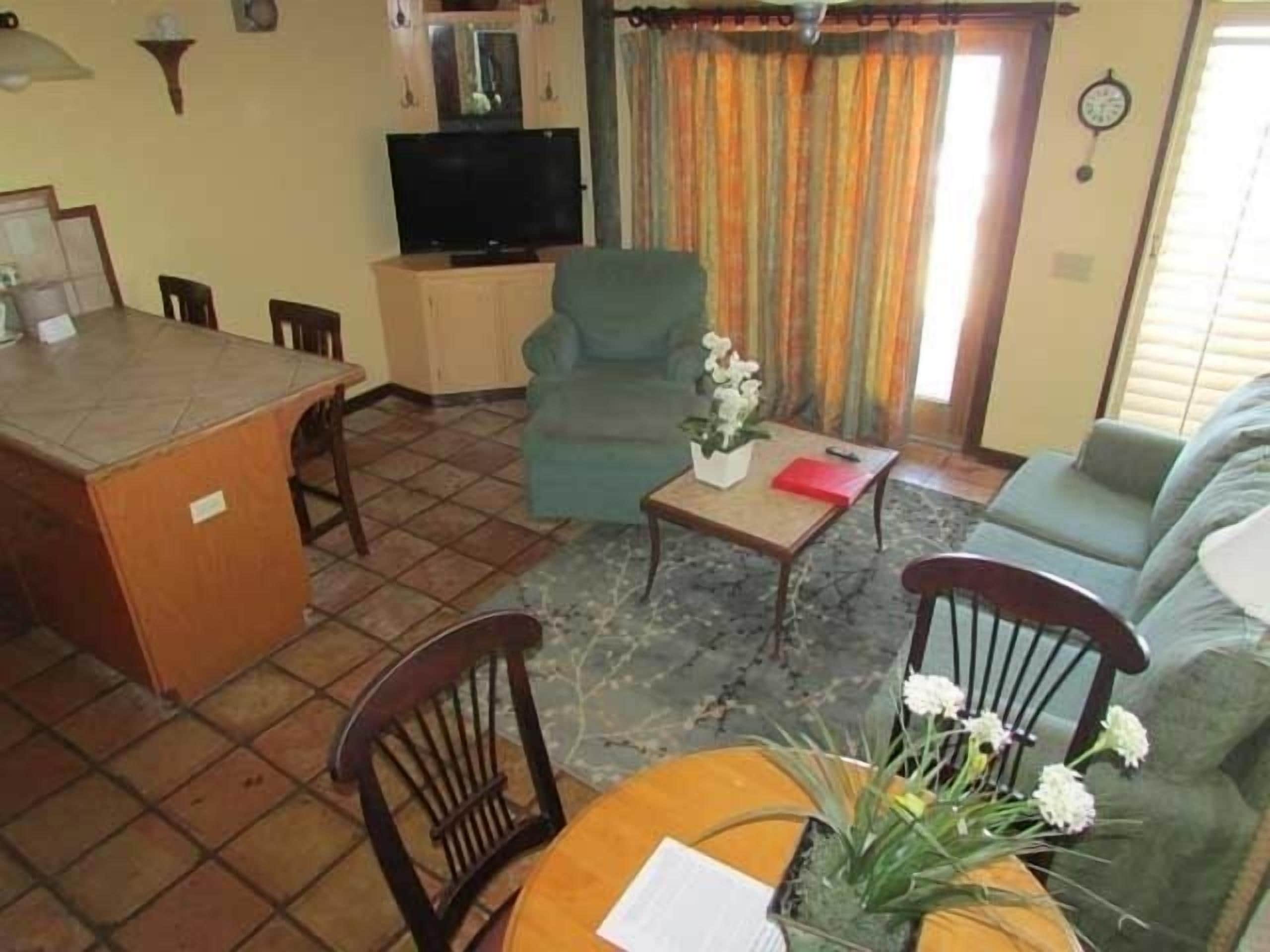 studio | living area | 30-inch lcd tv with cable channels, tv, dvd player