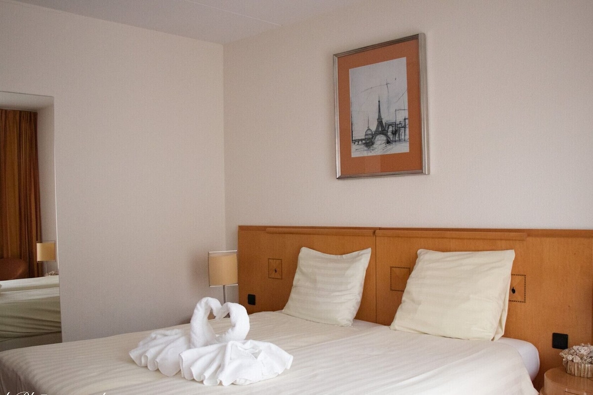 Deluxe tweepersoonskamer | Een kluis op de kamer, gratis wifi, beddengoed