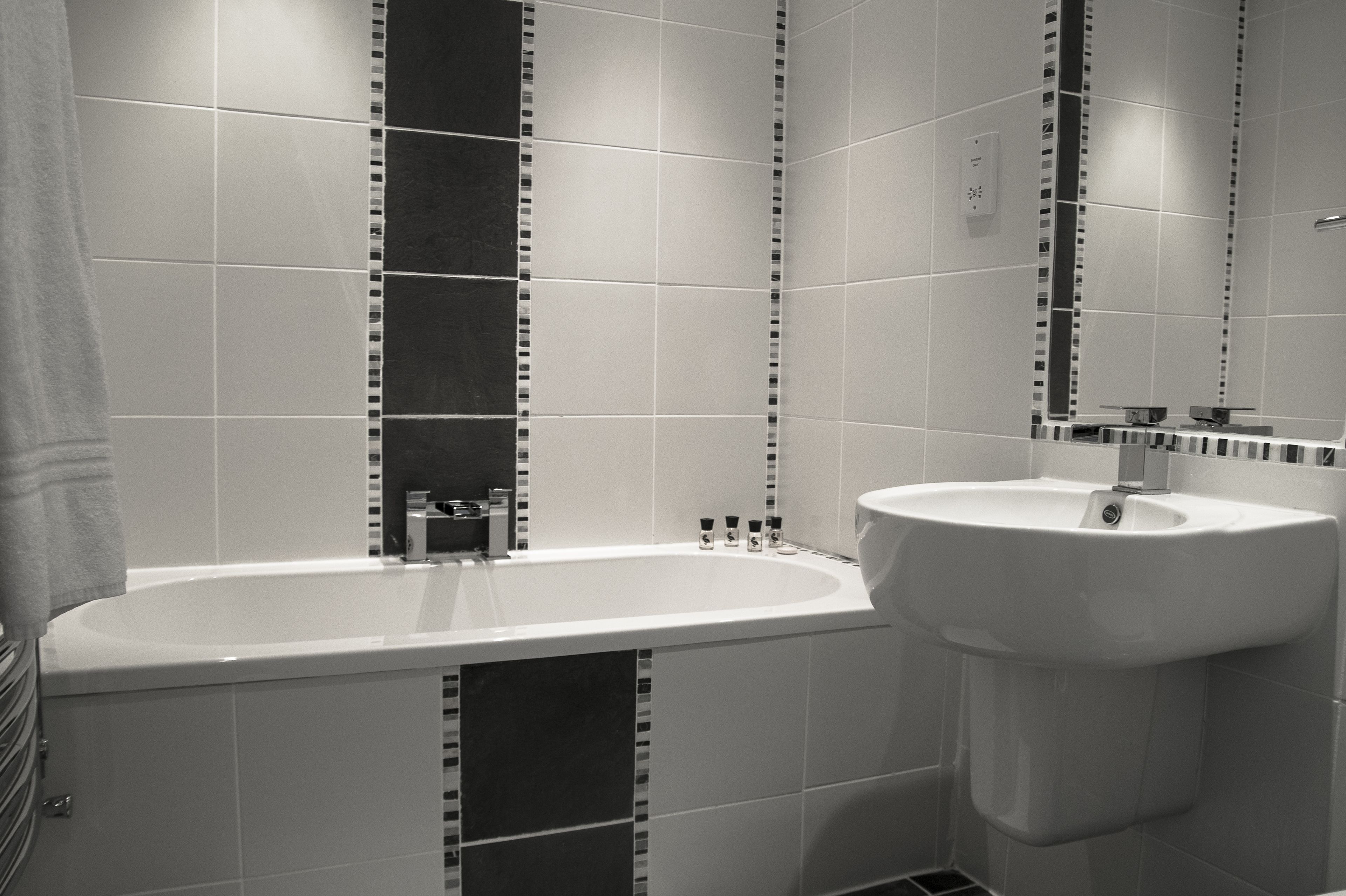 executive double or twin room | bathroom | hair dryer, towels