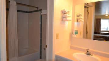 Deluxe Room, 2 Queen Beds | Bathroom | Combined shower/tub, towels