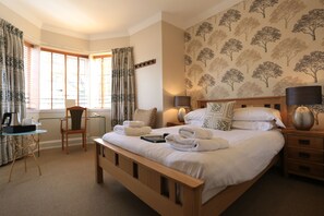 Premium bedding, individually decorated, individually furnished, desk