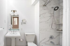 Combined shower/bathtub, free toiletries, hair dryer, bathrobes
