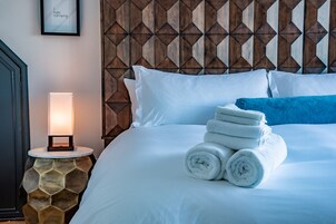 Deluxe Suite (Crow's Nest) | Premium bedding, down comforters, memory foam beds