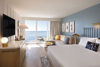 Oceanfront King Room with Balcony - NEWLY RENOVATED | 1 bedroom, minibar, in-room safe, individually decorated at The Sunny