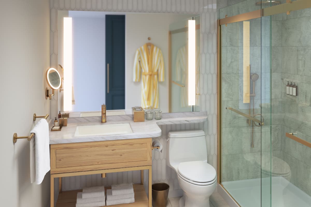 Eco-friendly toiletries, hair dryer, bathrobes, slippers