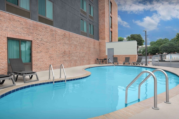 Outdoor pool, open 10:00 AM to 10:00 PM, sun loungers