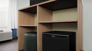 Premium bedding, desk, laptop workspace, blackout drapes
