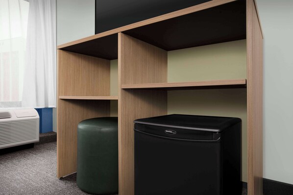 Premium bedding, desk, laptop workspace, blackout drapes