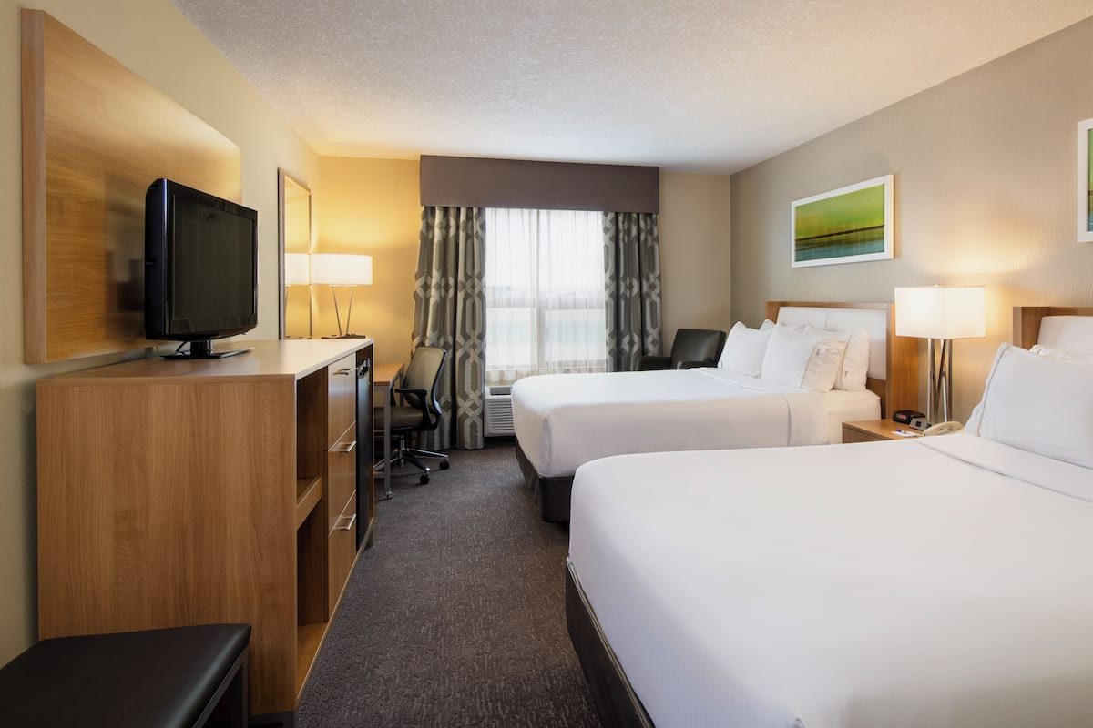 Standard Room, 2 Queen Beds (Bath Shower Combination) | 1 bedroom, desk, laptop workspace, blackout curtains