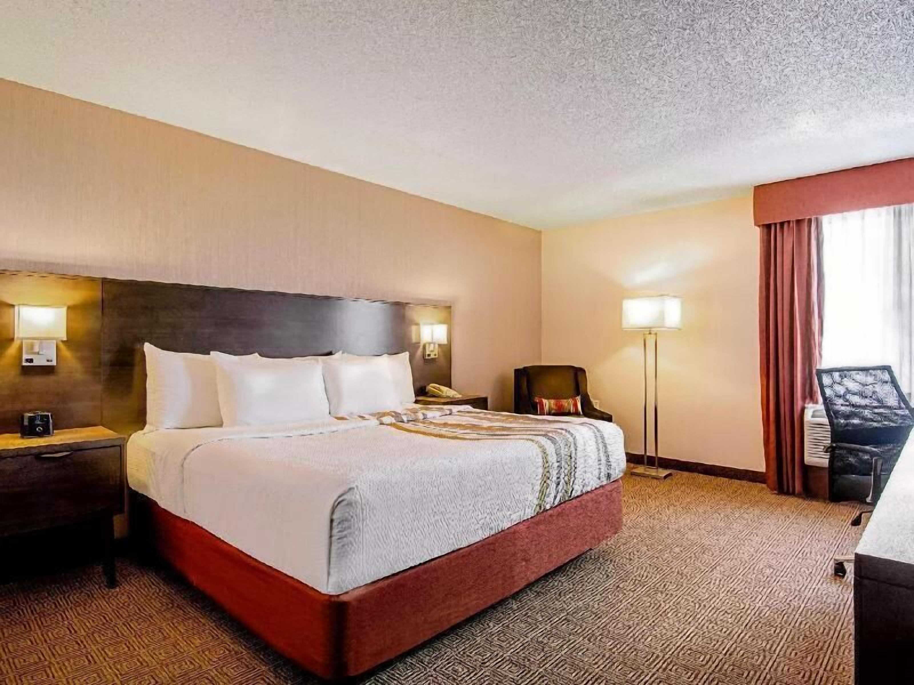 Premium bedding, pillow-top beds, in-room safe, desk