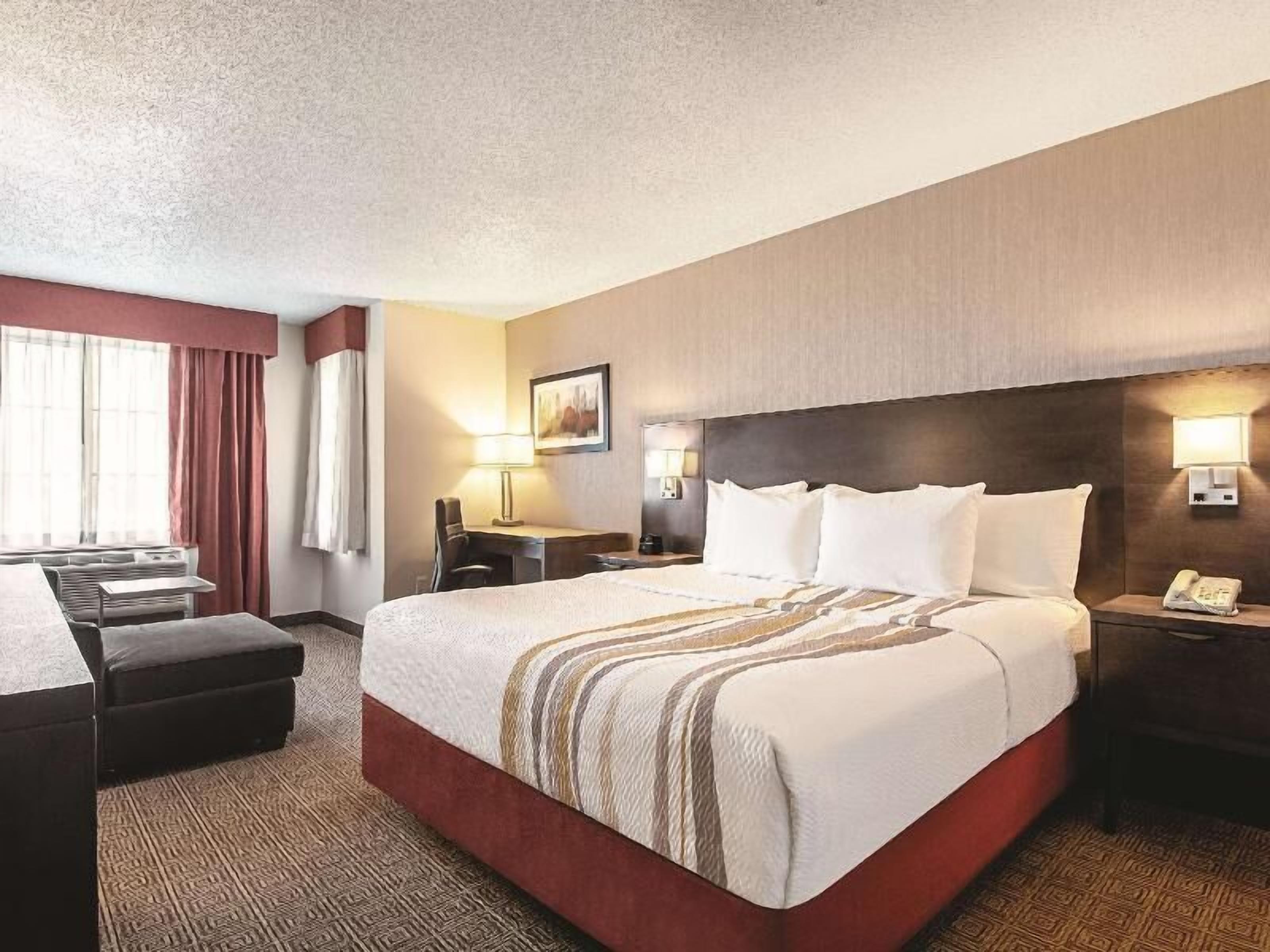 Premium bedding, pillow-top beds, in-room safe, desk