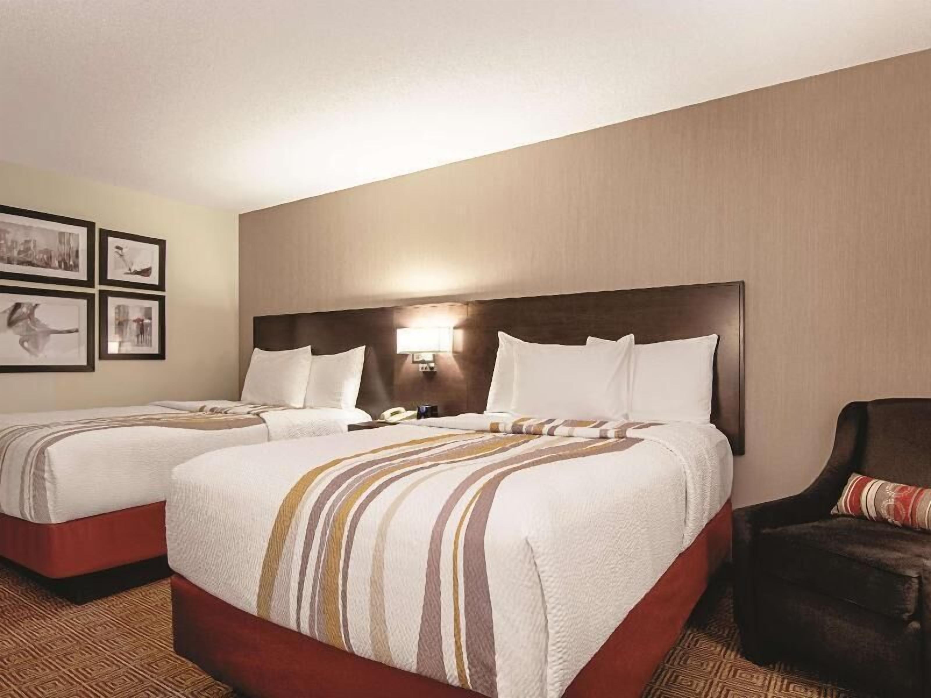 Premium bedding, pillow-top beds, in-room safe, desk