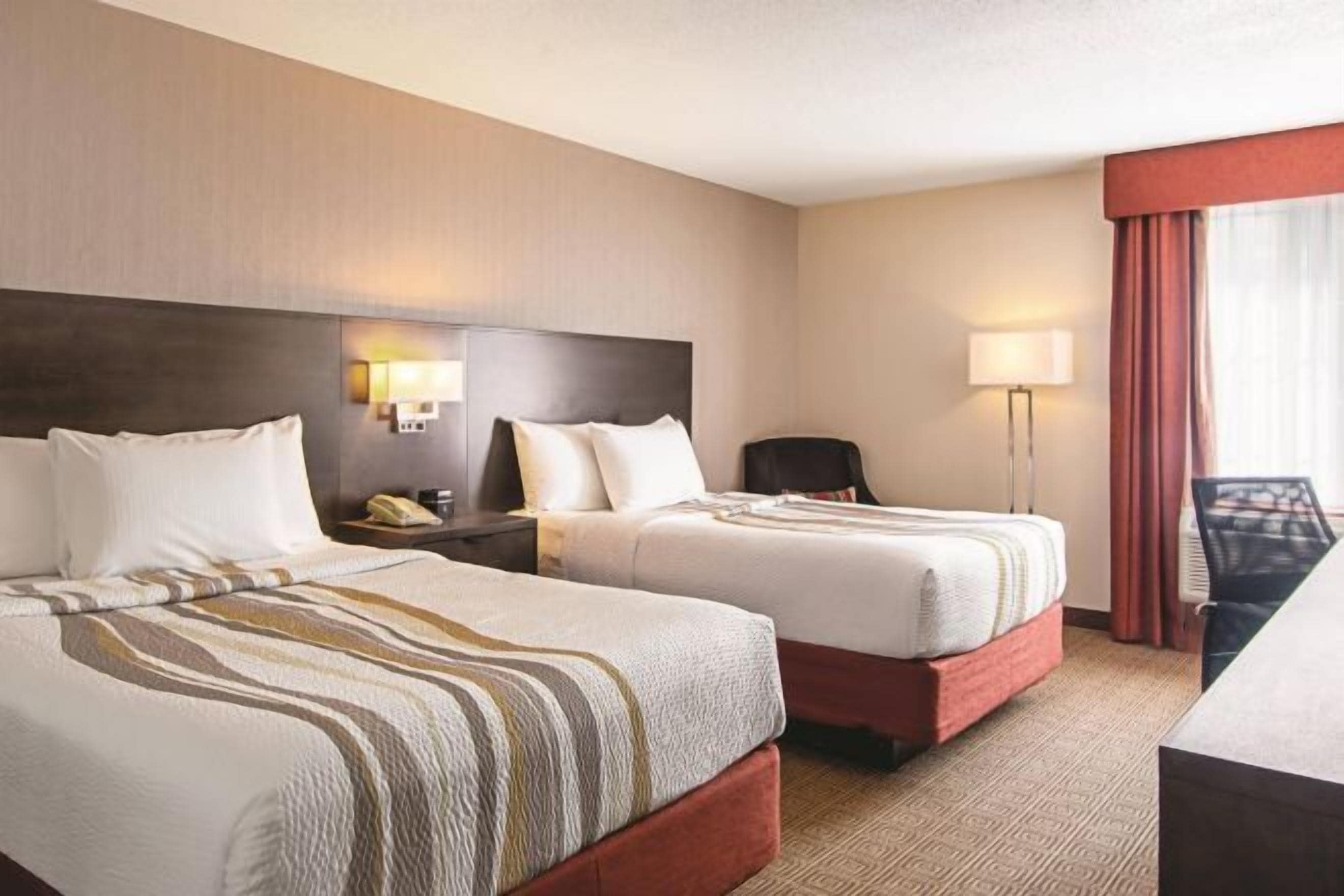 Premium bedding, pillow-top beds, in-room safe, desk