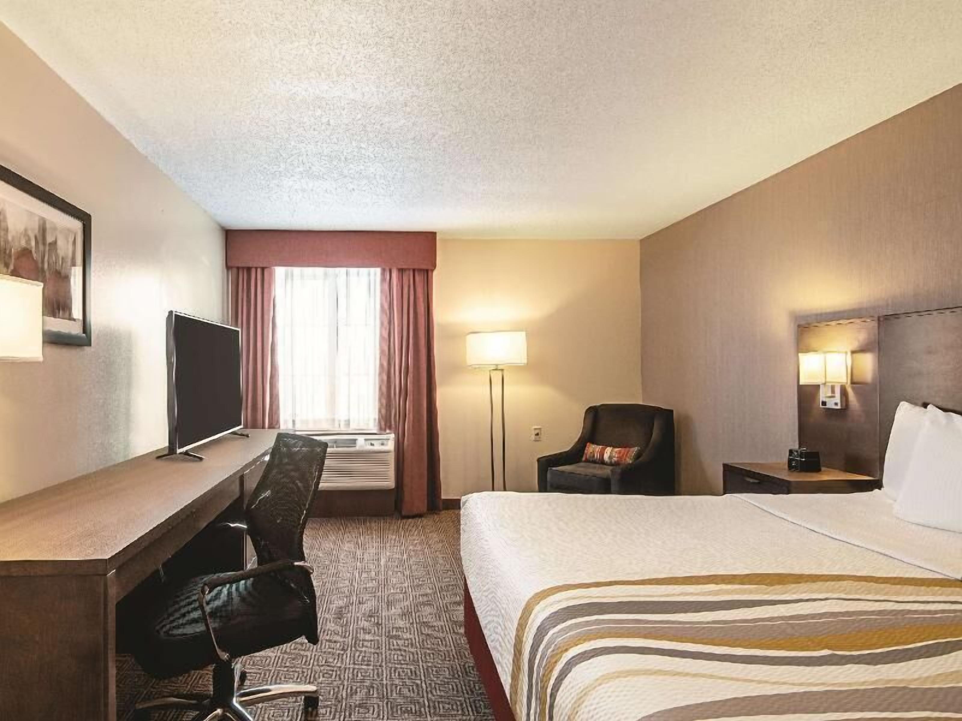 Premium bedding, pillow-top beds, in-room safe, desk