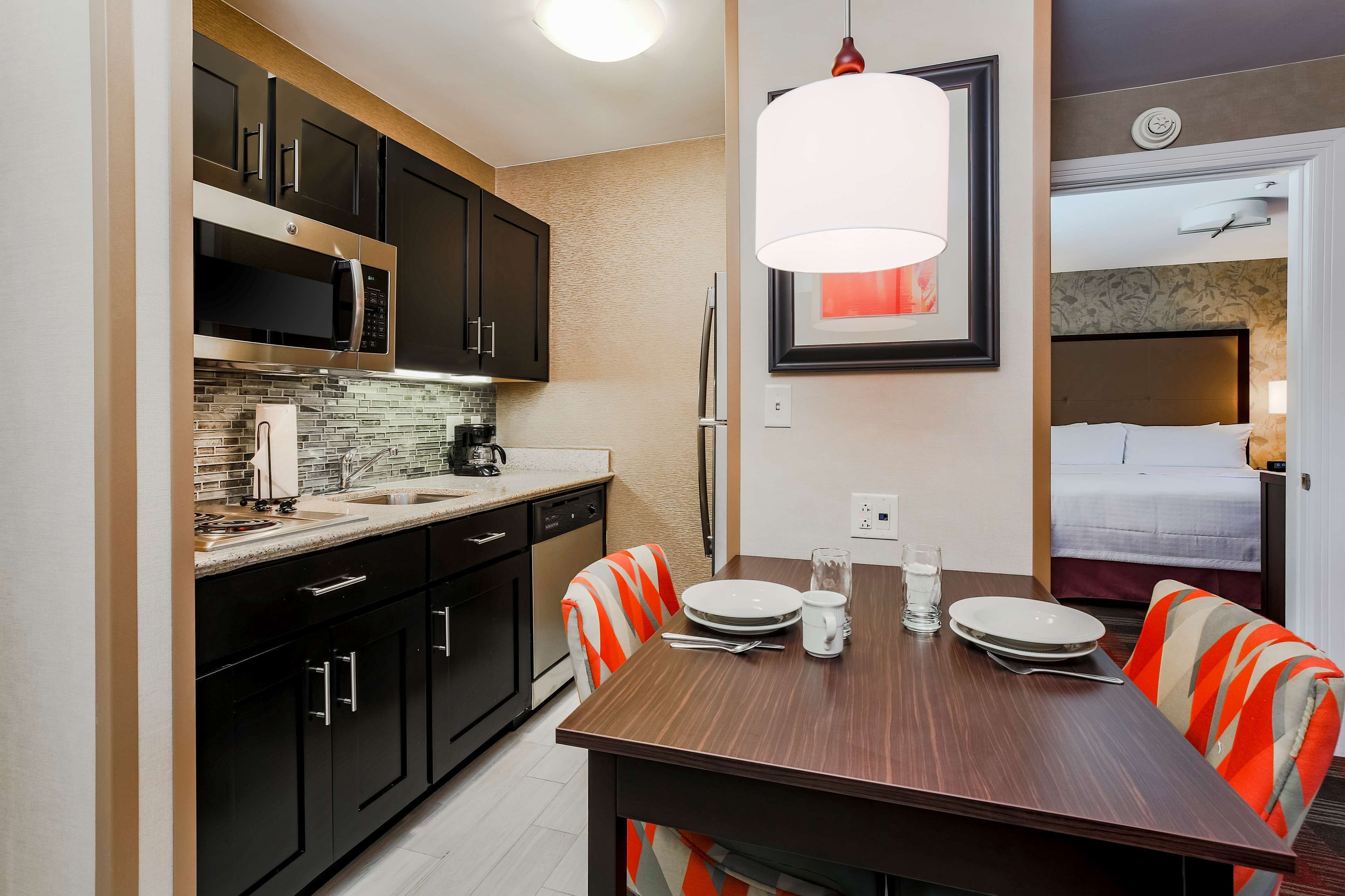 suite, 1 king bed, accessible, non smoking (mobility & hearing, roll-in shower) | private kitchen | full-sized fridge, microwave, stovetop, dishwasher