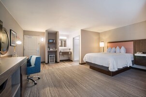 Premium bedding, desk, laptop workspace, blackout curtains