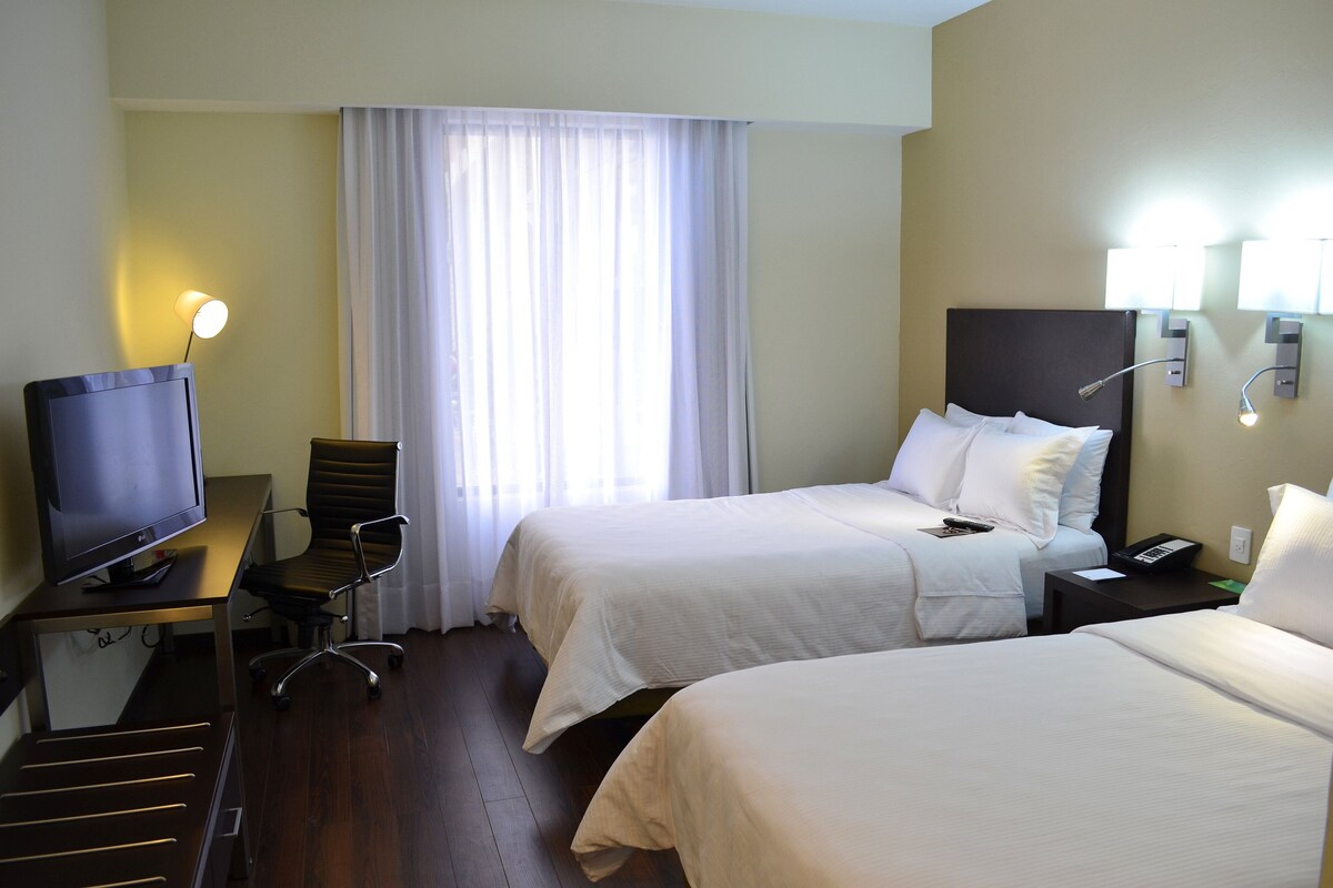 In-room safe, desk, iron/ironing board, cribs (free)