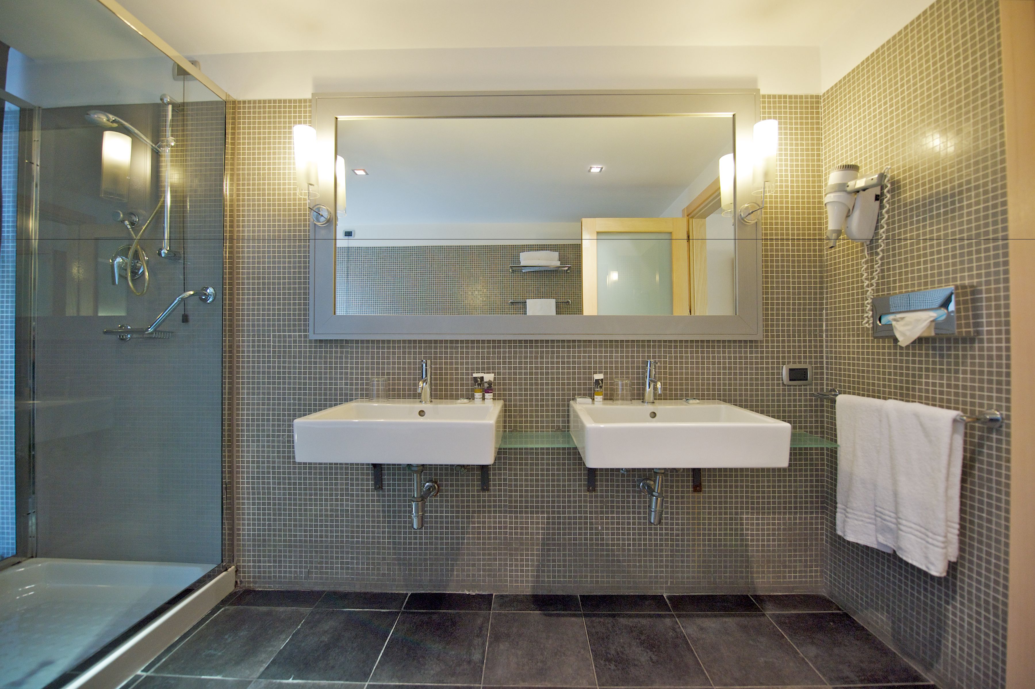 eco-friendly toiletries, hair dryer, bidet, towels