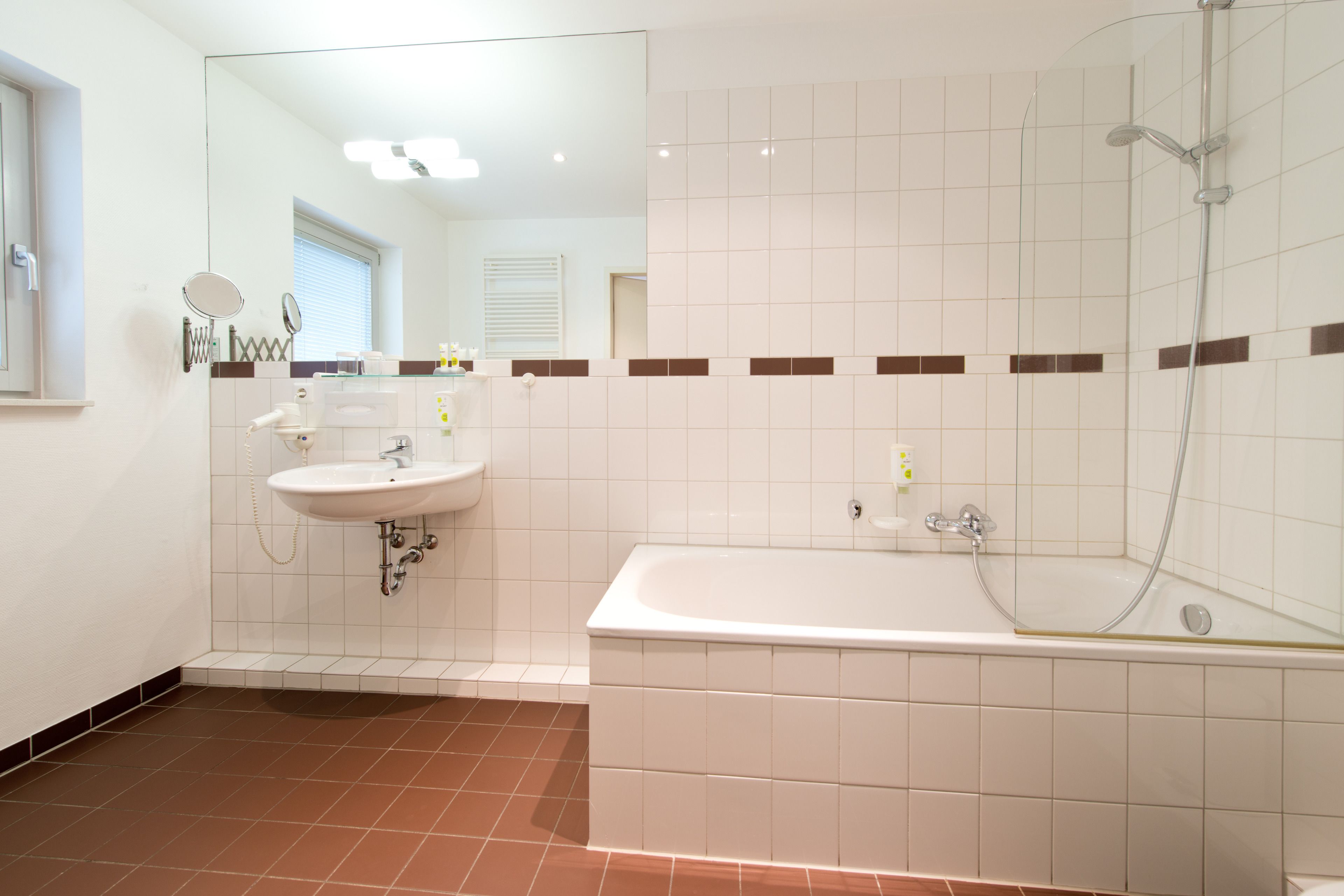 eco-friendly toiletries, hair dryer, towels