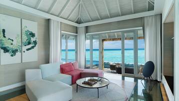 Water Suite | Living area | 45-inch TV with satellite channels, offices