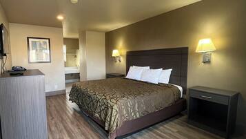 標準客房, 1 張特大雙人床 | 書桌、免費 Wi-Fi、床單