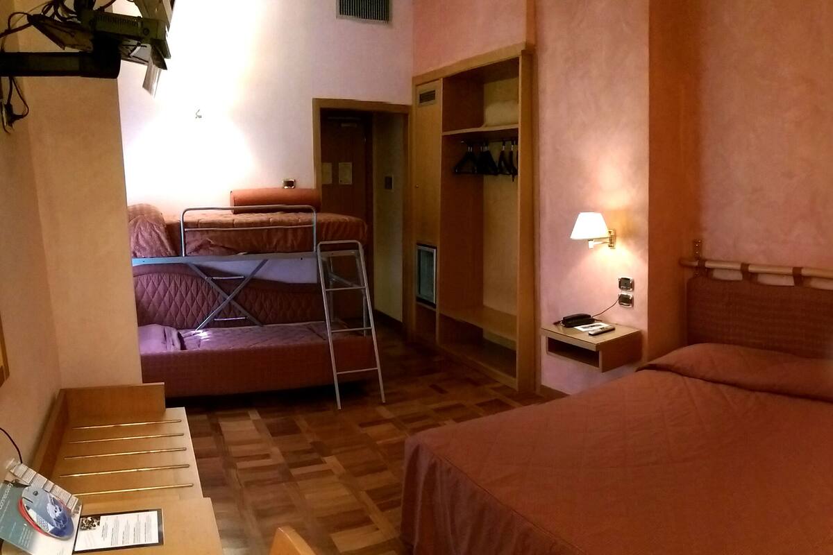 Triple Room | Minibar, in-room safe, desk, soundproofing