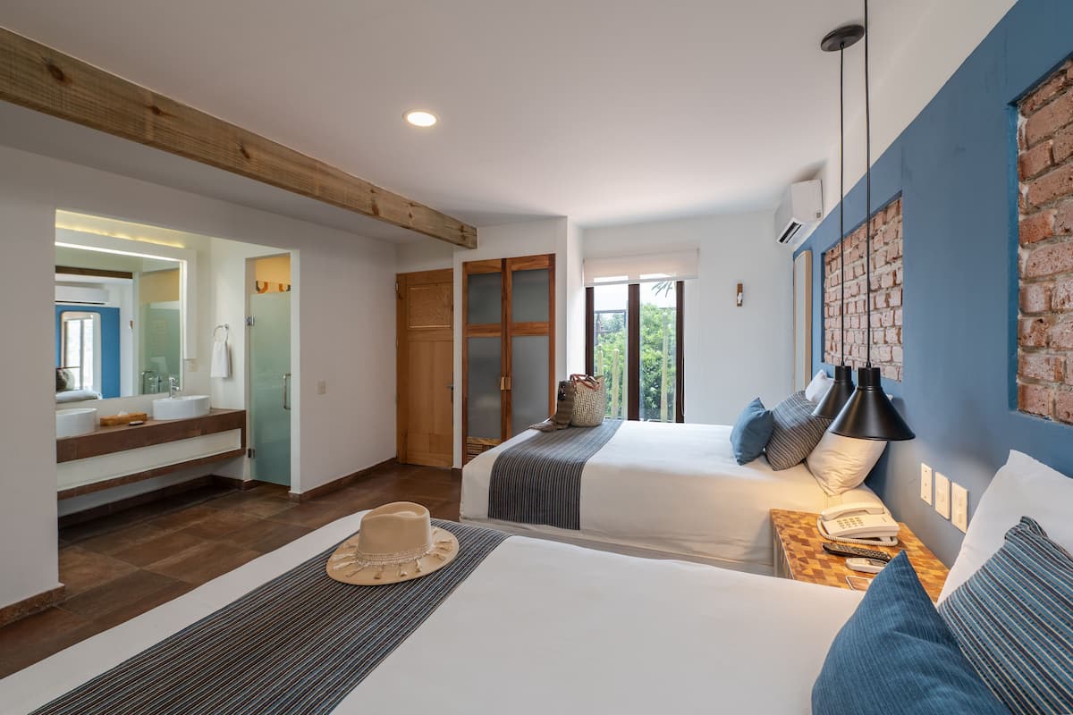 Superior kamer, 2 tweepersoonsbedden | 1 slaapkamer, luxe beddengoed, donzen dekbedden, een kluis op de kamer