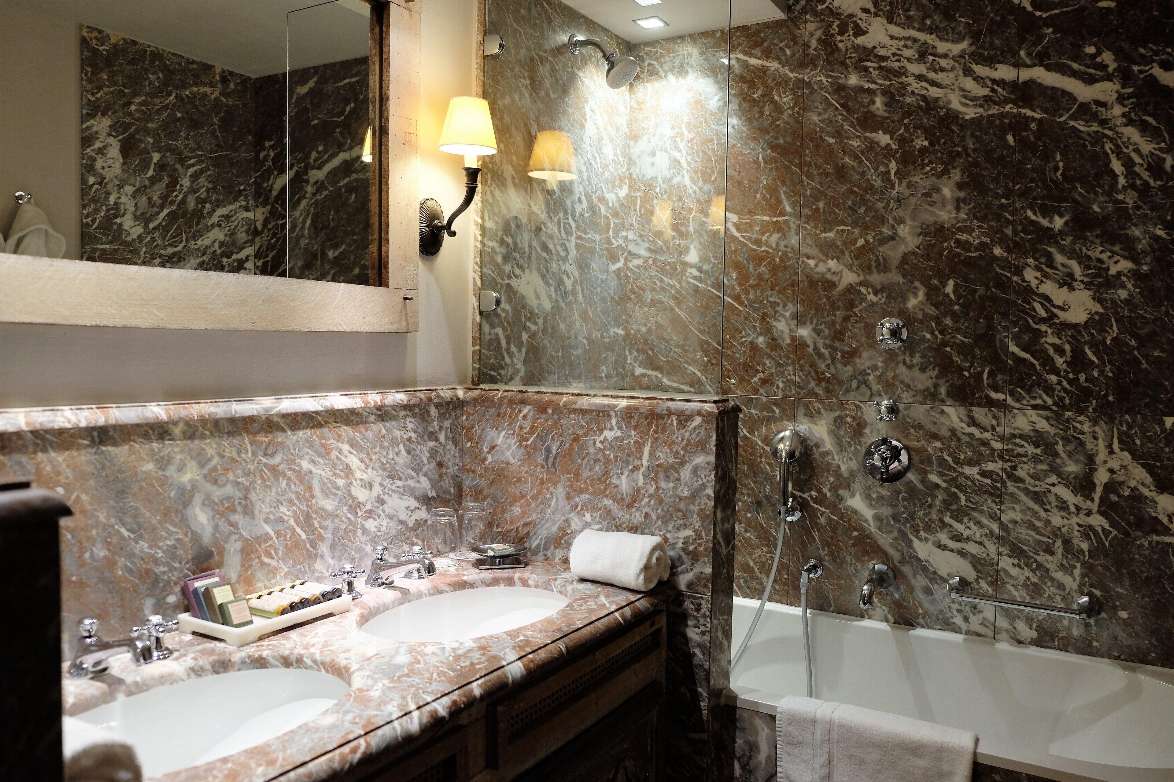 superior canal view room | bathroom | free toiletries, hair dryer, slippers, towels