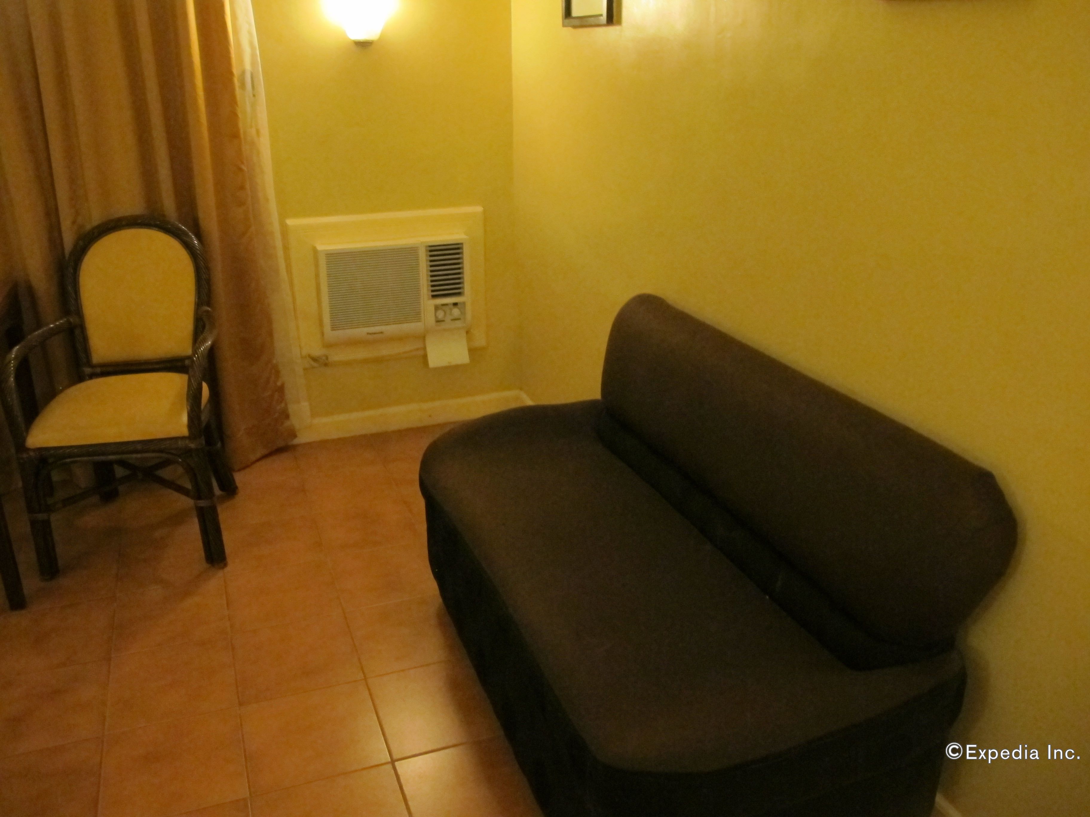 premier room, 1 queen bed | living area | lcd tv